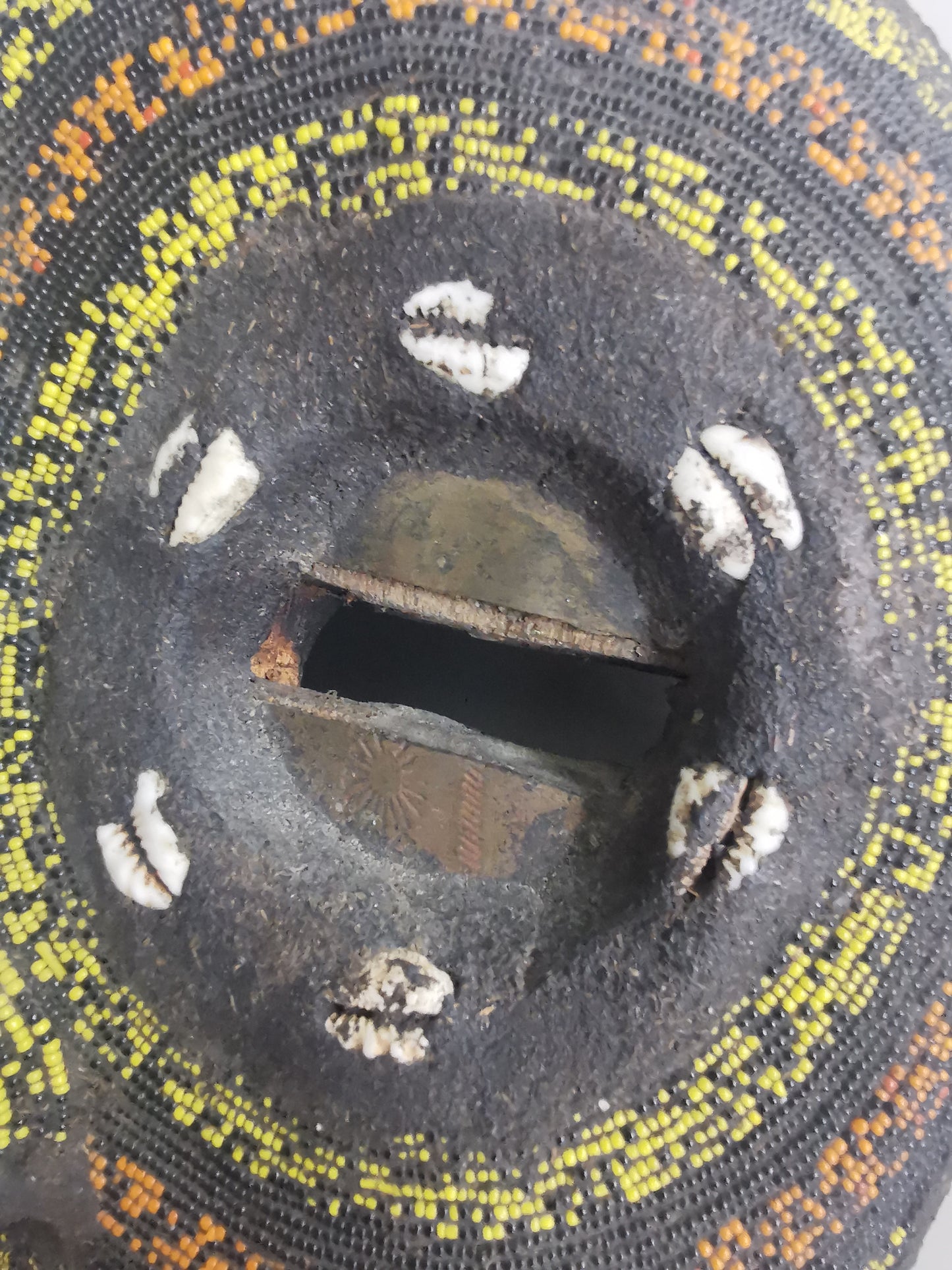 Ashanti Baluba Moon Mask with coloured jigda beads and cowry shells