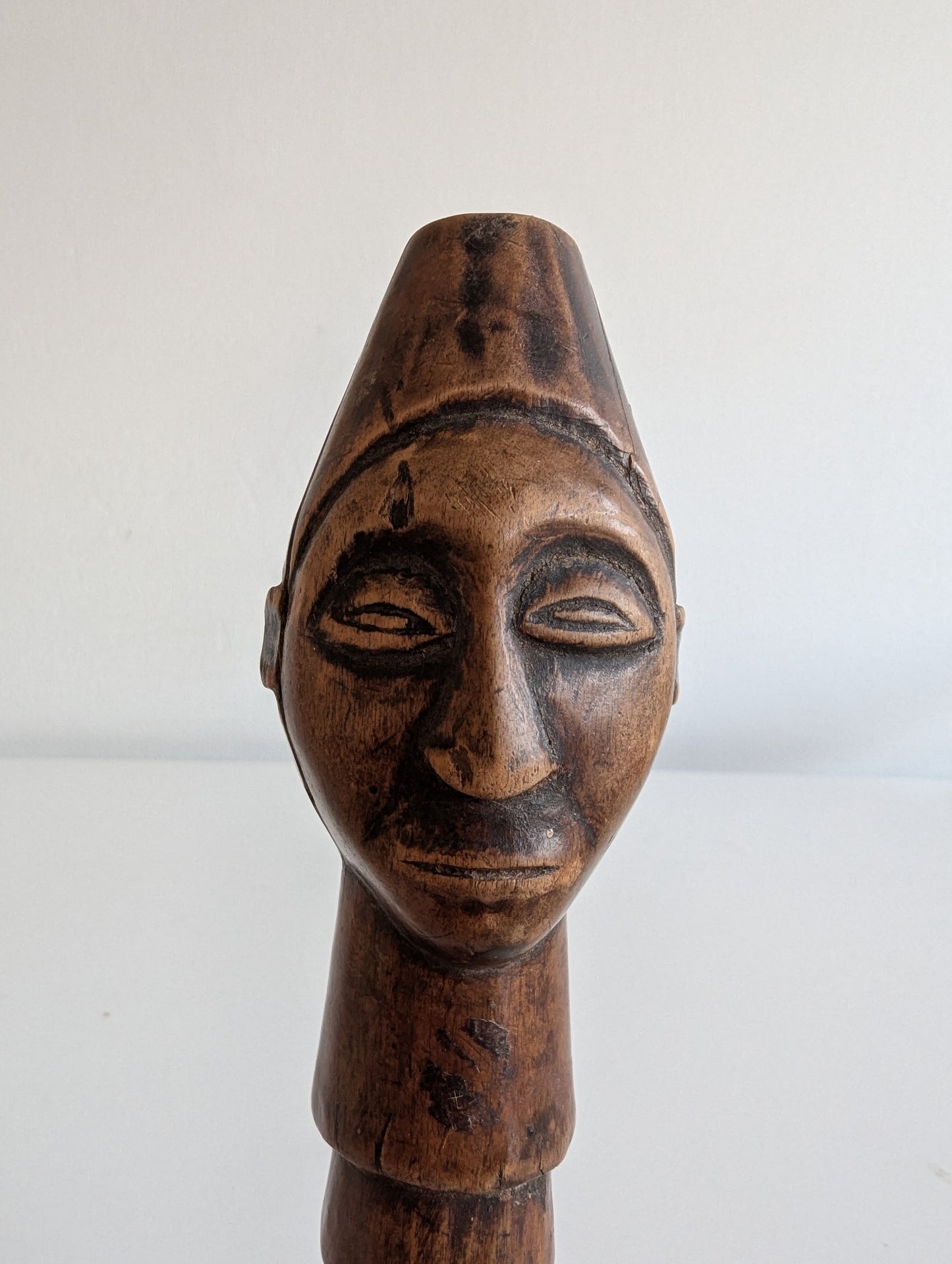 Hemba wooden staff topper or finial representing a male face