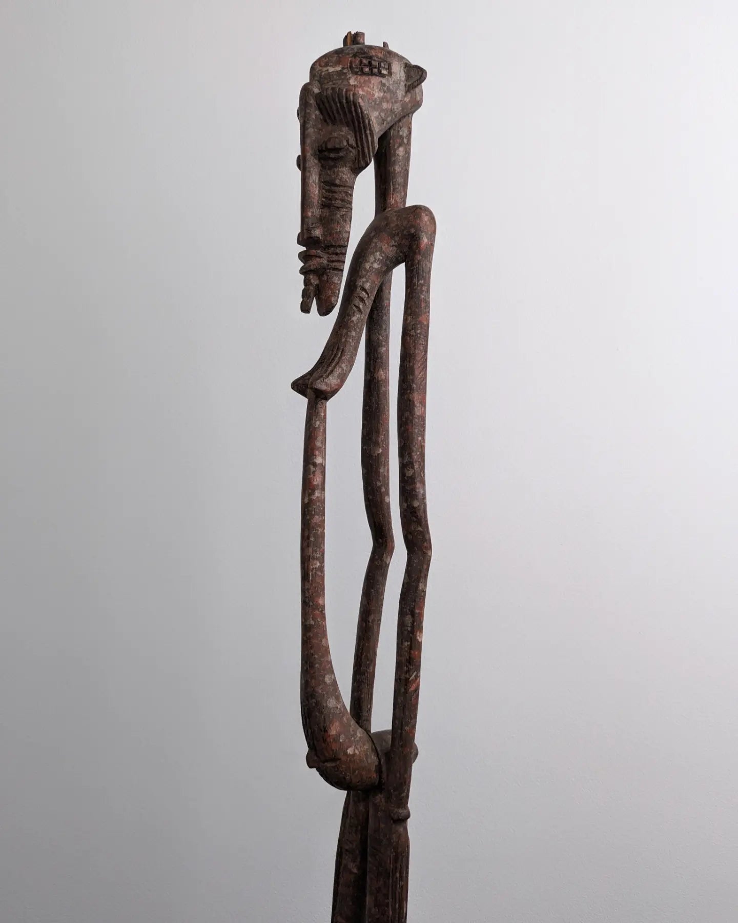 Senufo carved wood standing female stick figure