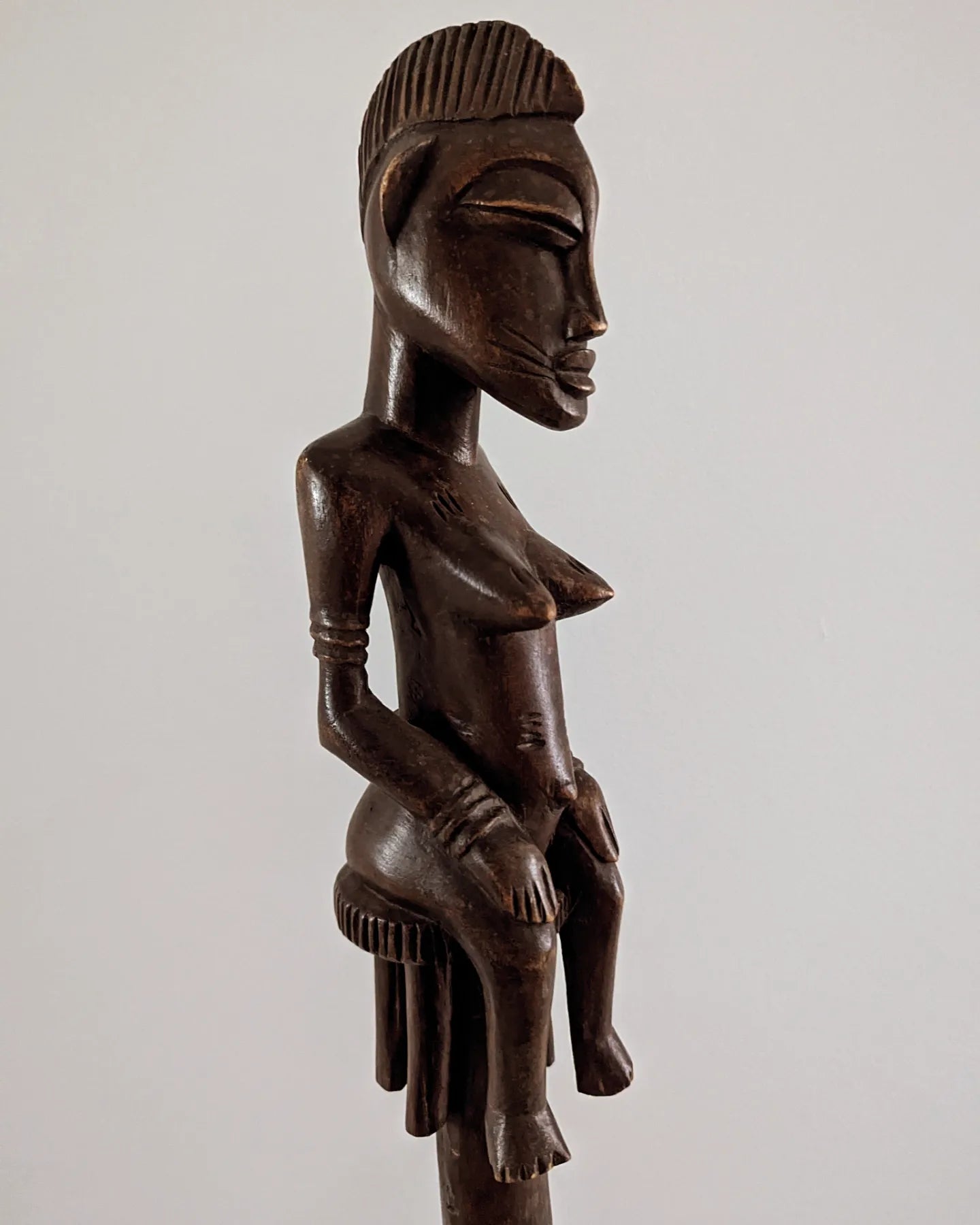 Pair of tall Yoruba carved wood ceremonial standing male and female figures