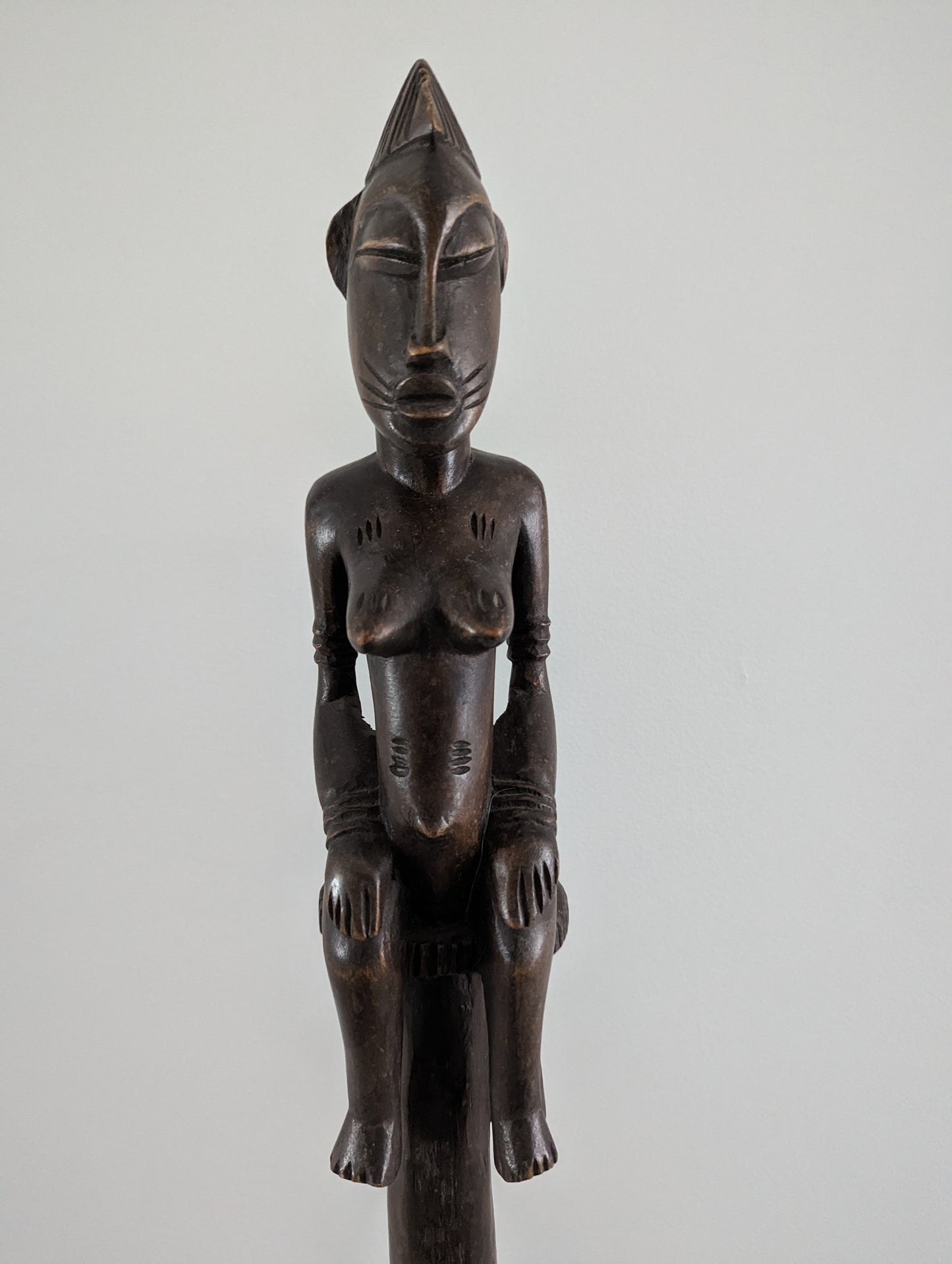 Pair of tall Yoruba carved wood ceremonial standing male and female figures