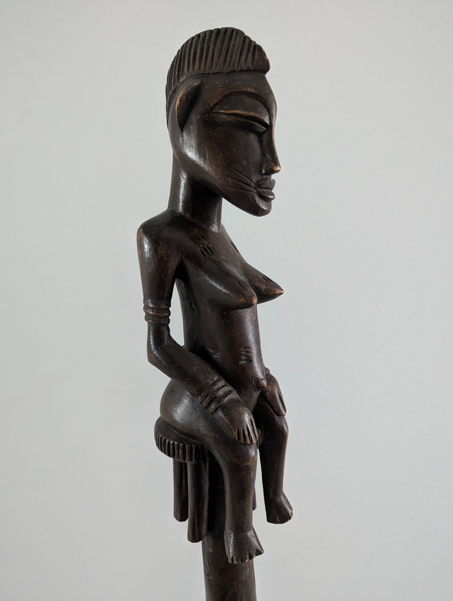 Pair of tall Yoruba carved wood ceremonial standing male and female figures