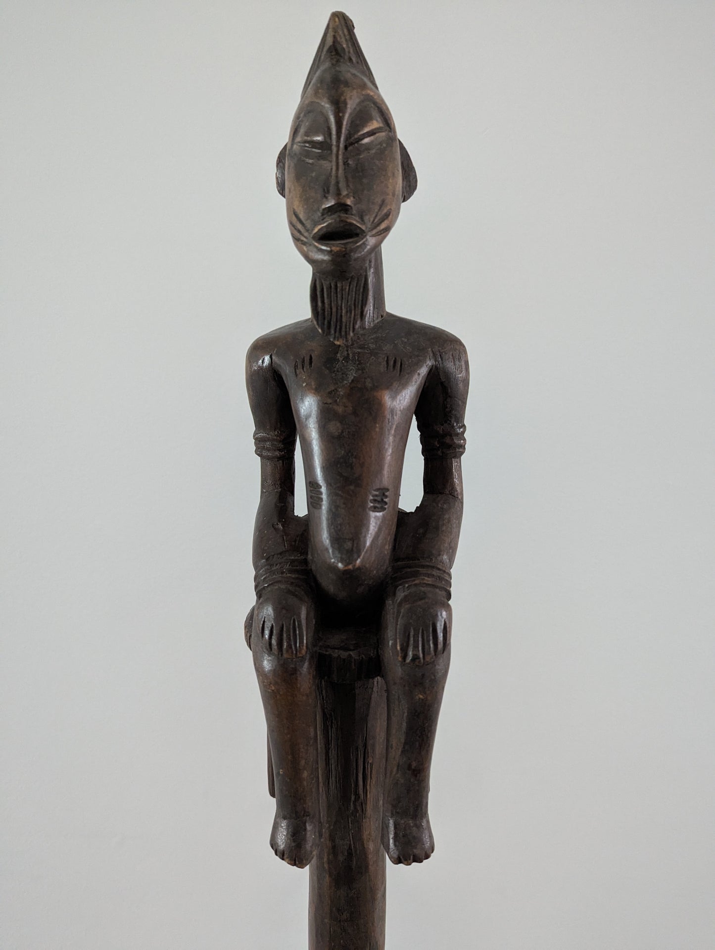 Pair of tall Yoruba carved wood ceremonial standing male and female figures