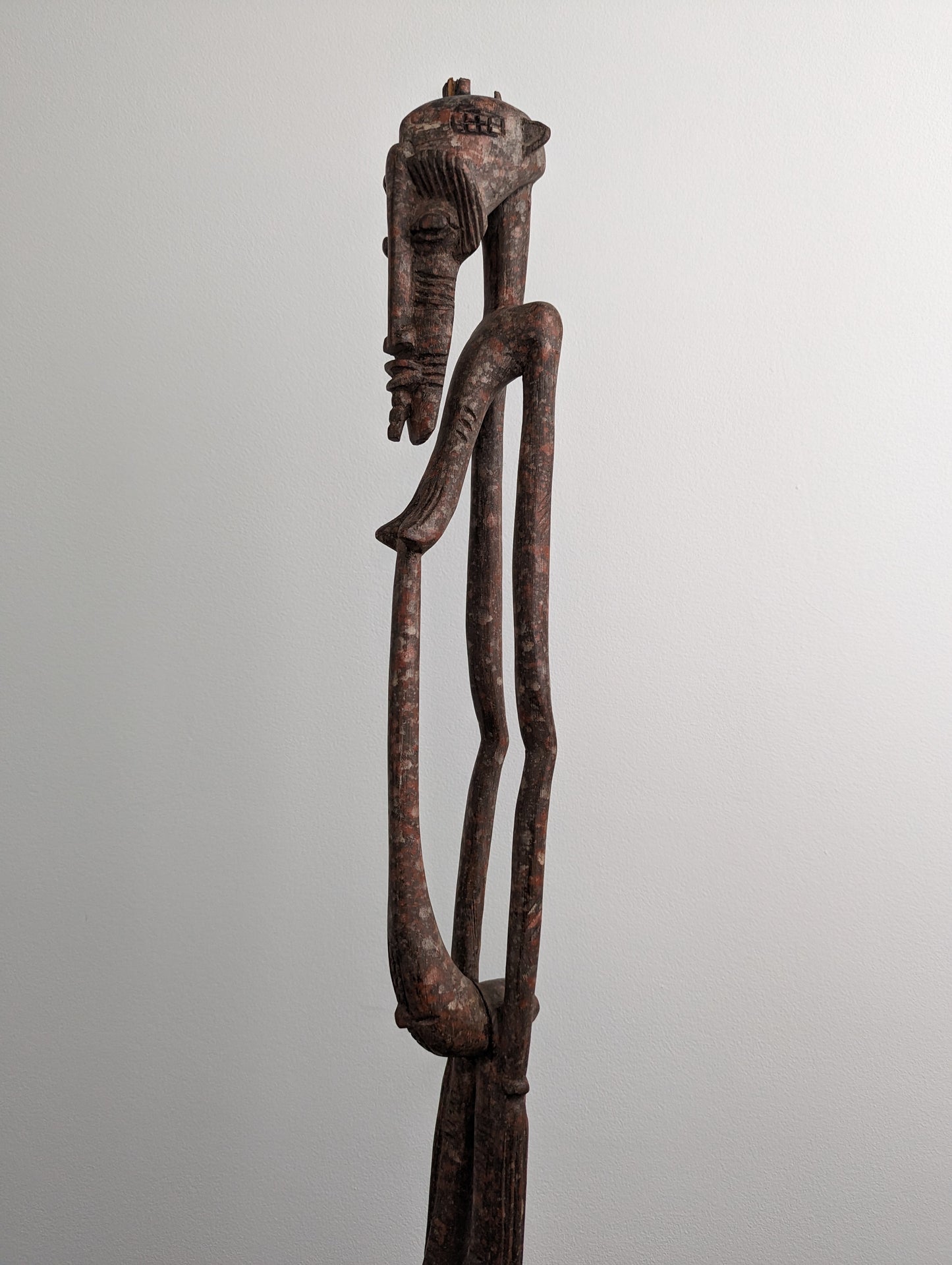 Senufo carved wood standing female stick figure