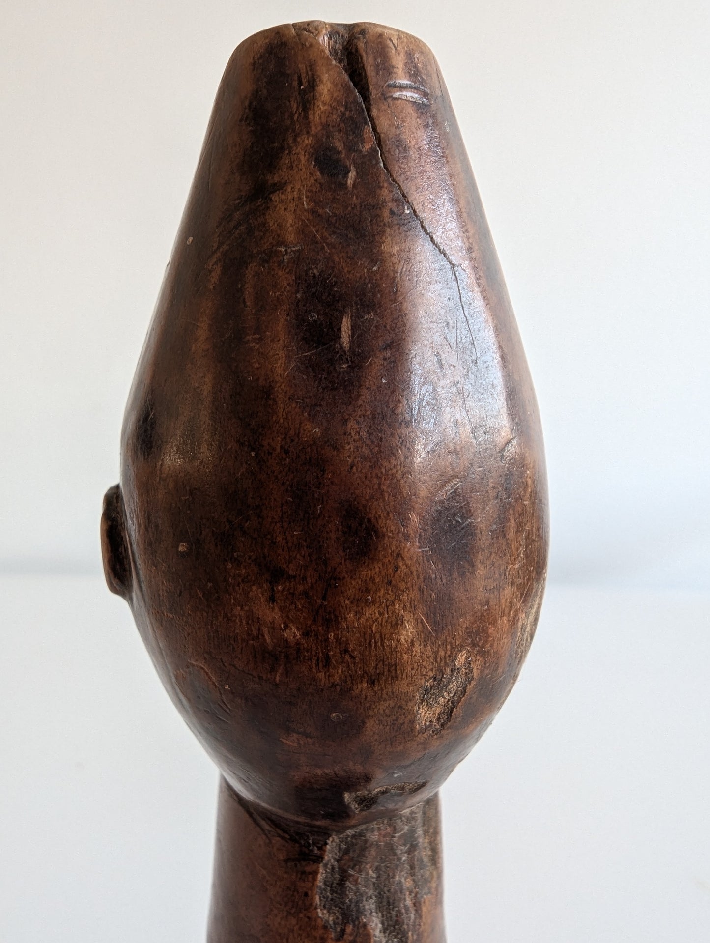 Hemba wooden staff topper or finial representing a male face