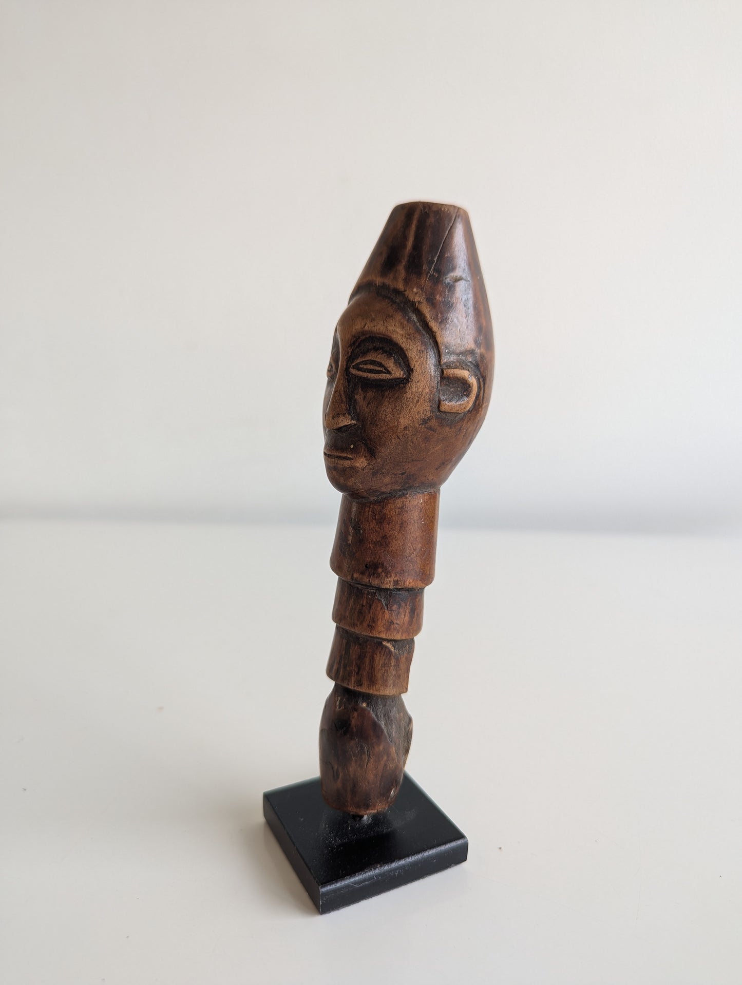 Hemba wooden staff topper or finial representing a male face