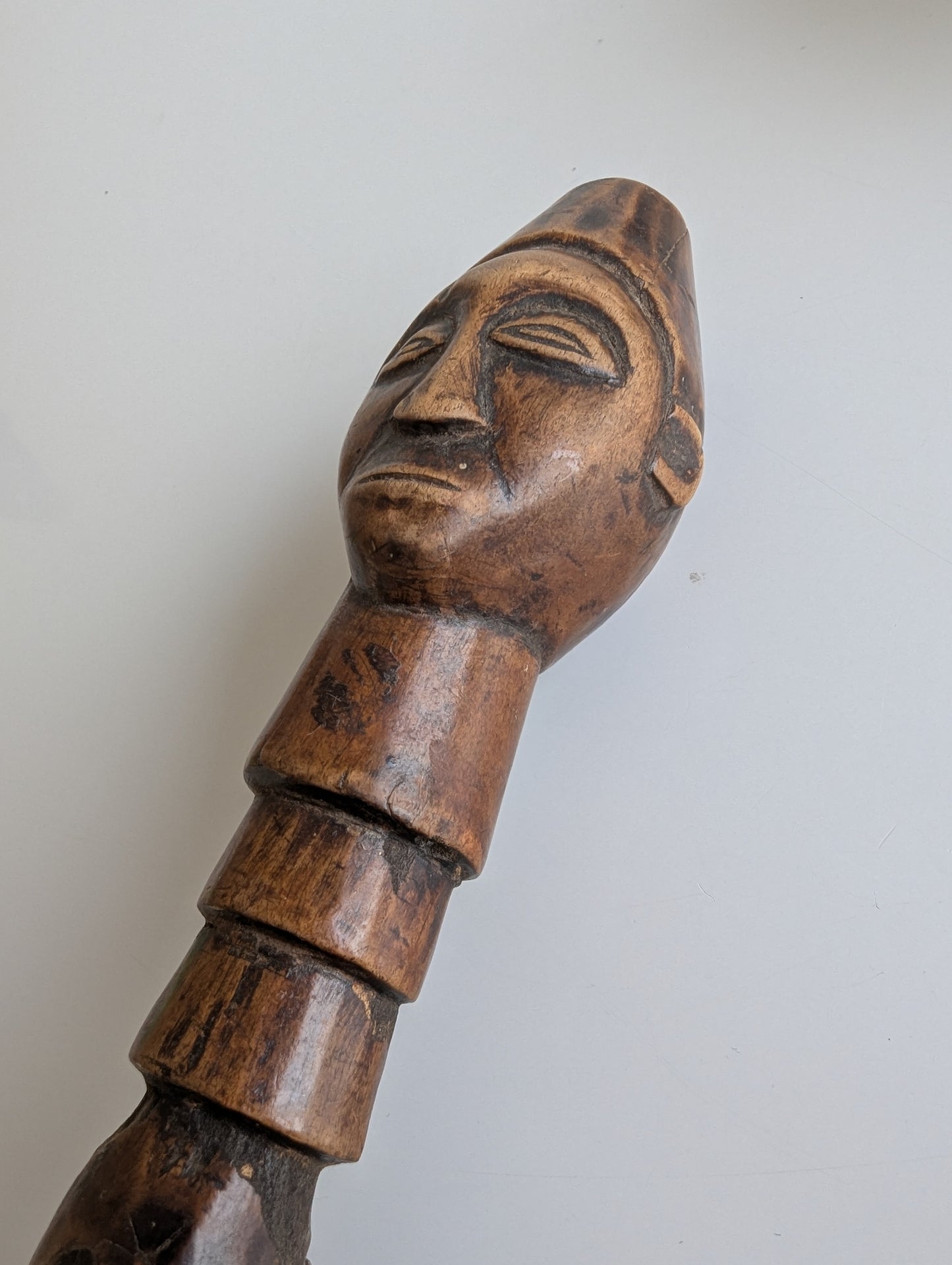 Hemba wooden staff topper or finial representing a male face