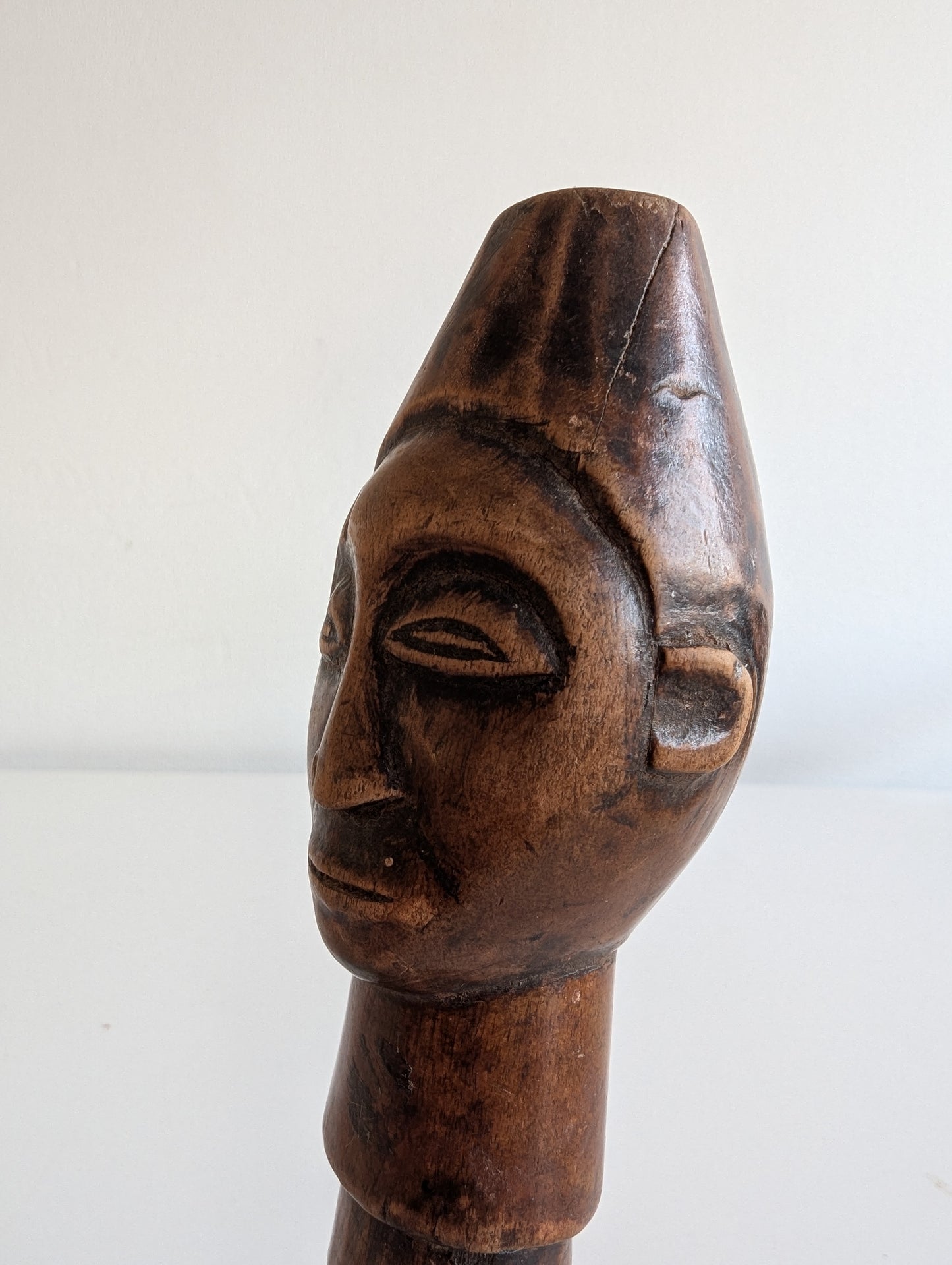 Hemba wooden staff topper or finial representing a male face