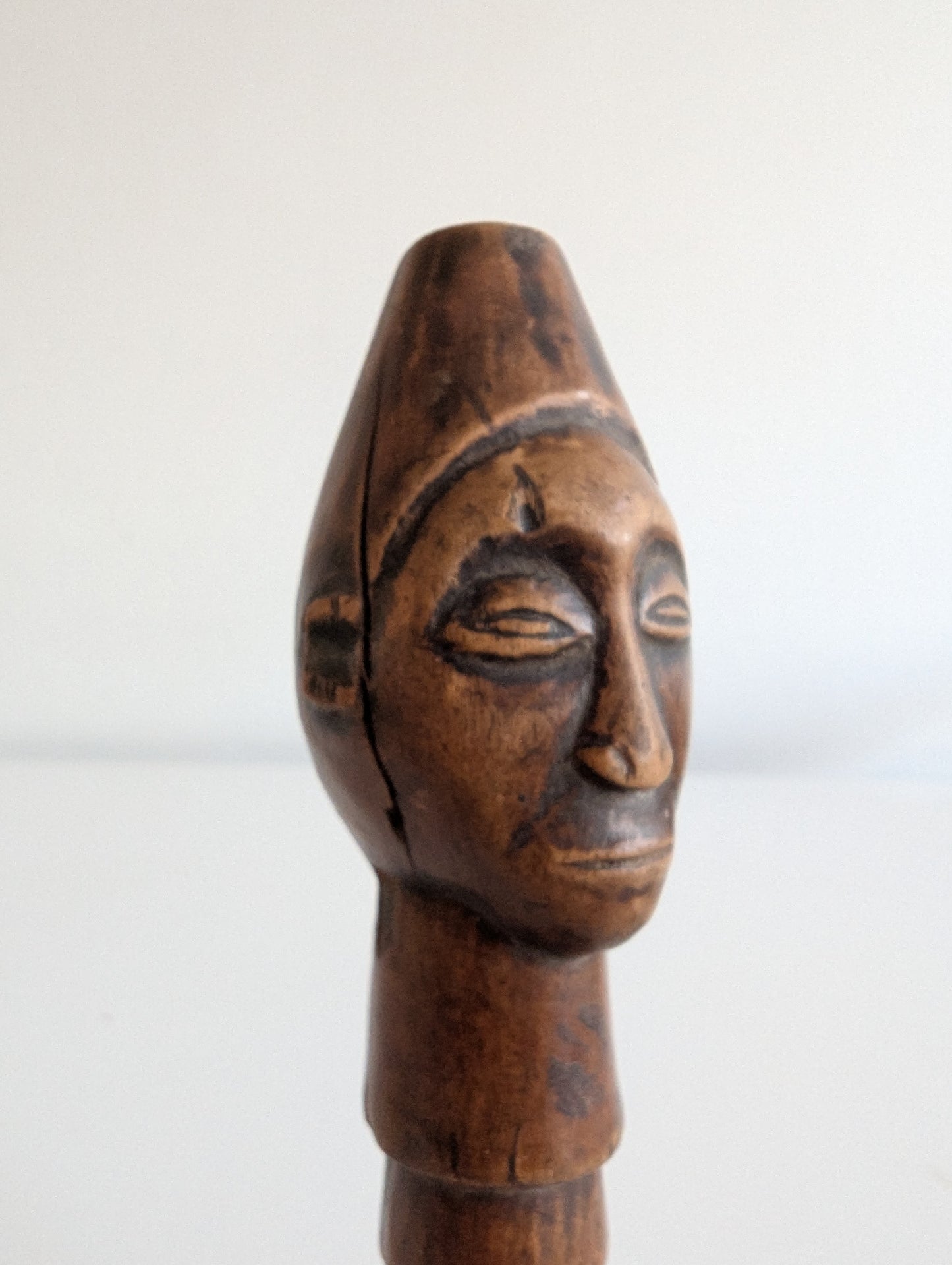 Hemba wooden staff topper or finial representing a male face