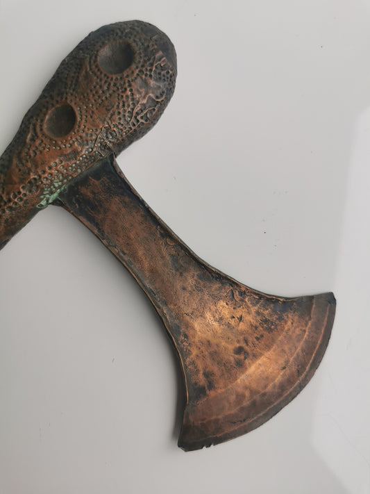 Detail of the axe blade. African Tribal Sapo Songye Ceremonial Axe made of wood and copper